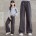 Echte schwarze Hose mit weitem Bein im Taschenstil 3