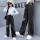 Schwarze, karierte Hose mit weitem Bein und echter Tasche  + $1,49 
