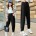Schwarze schlichte Hose mit echten Taschen