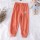 Orangefarbene Hose 