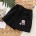 schwarze bestickte Shorts